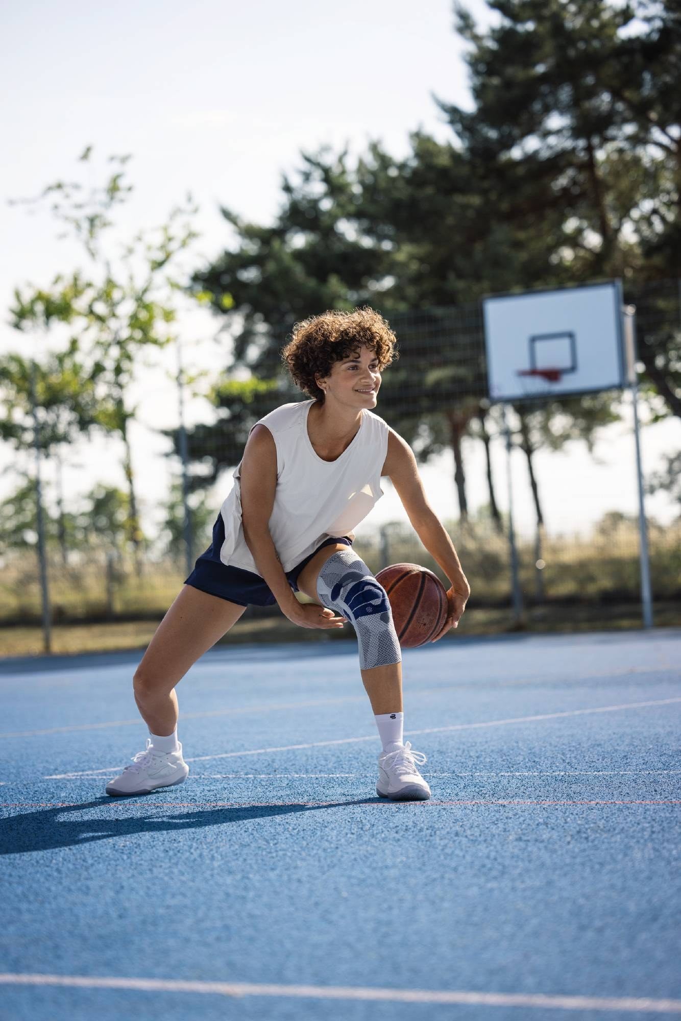 Bauerfeind GenuTrain P3 Knee Brace worn playing basketball
