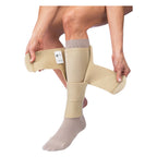 JOBST FarrowWrap 4000 Legpiece in Beige being wrapped around the lower leg over a liner